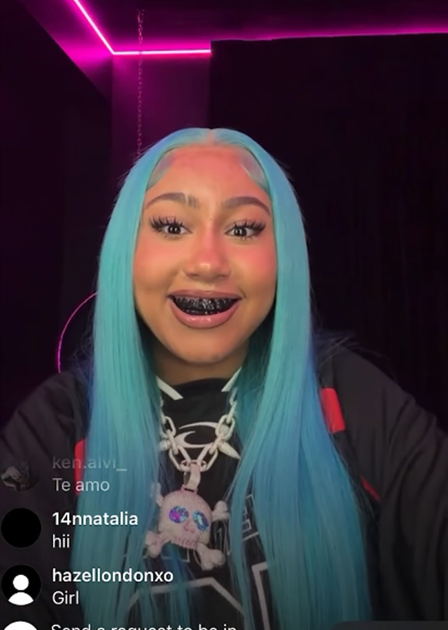 North West with blue hair and black dental grills during a social media livestream